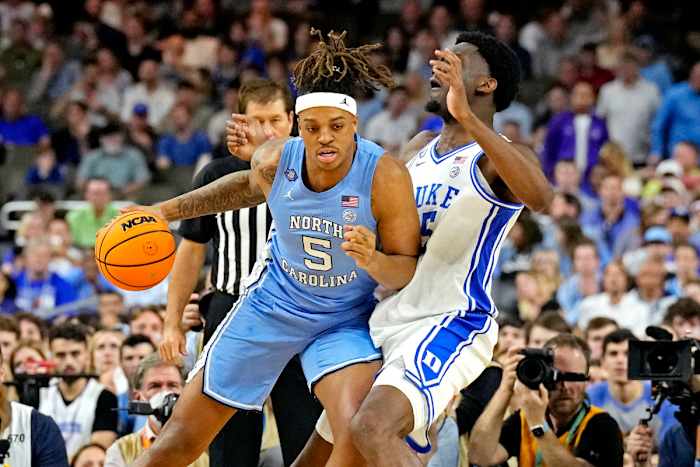 Apr 2, 2022; New Orleans, LA, USA; North Carolina Tar Heels forward Armando Bacot (5) drives to the basket against Duke Blue Devils forward Paolo Banchero (5) in the 2022 NCAA men's basketball tournament Final Four semifinals at Caesars Superdome. Mandatory Credit: Robert Deutsch-USA TODAY Sports
